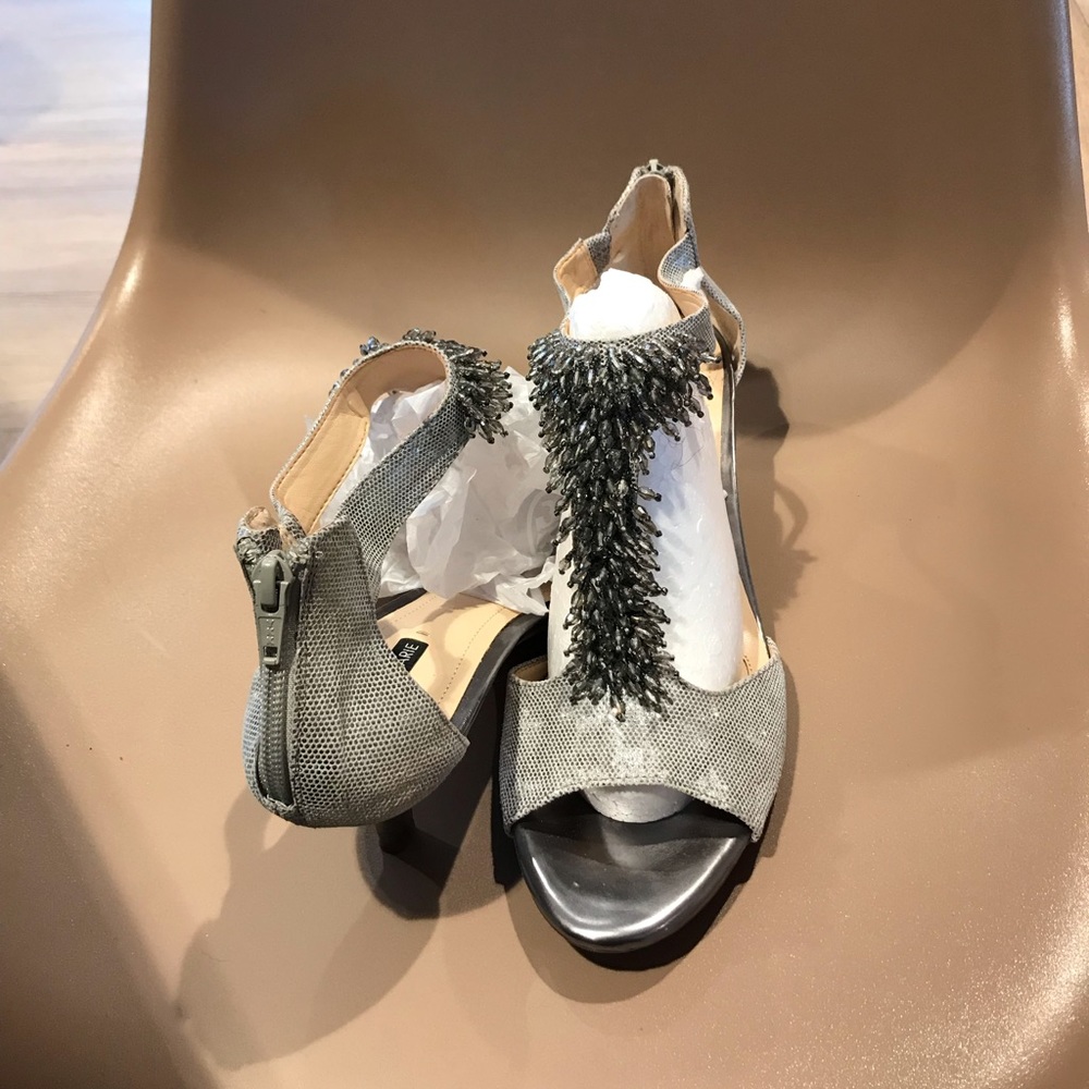 Dress heel, new from Dillard's, Size 11,